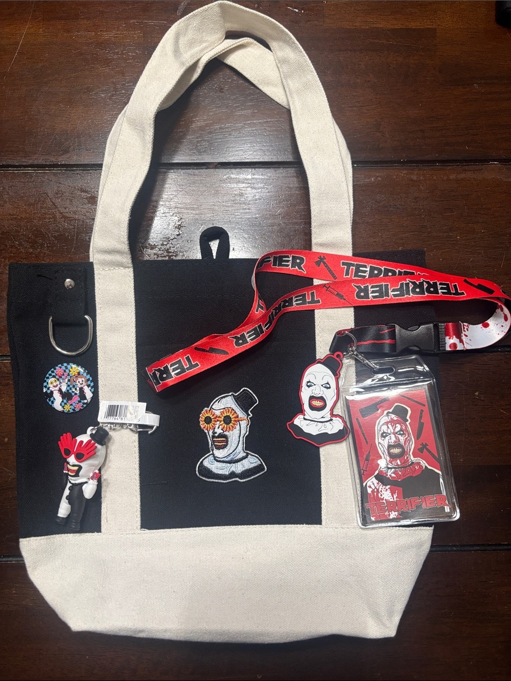 Spirit Halloween Terrifier Tote Bag with Lanyard, pin, and bag clip